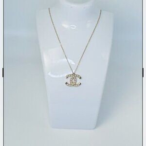 CHANEL CC charm with Gold tone and pearl accents on 18K 18" gold chain